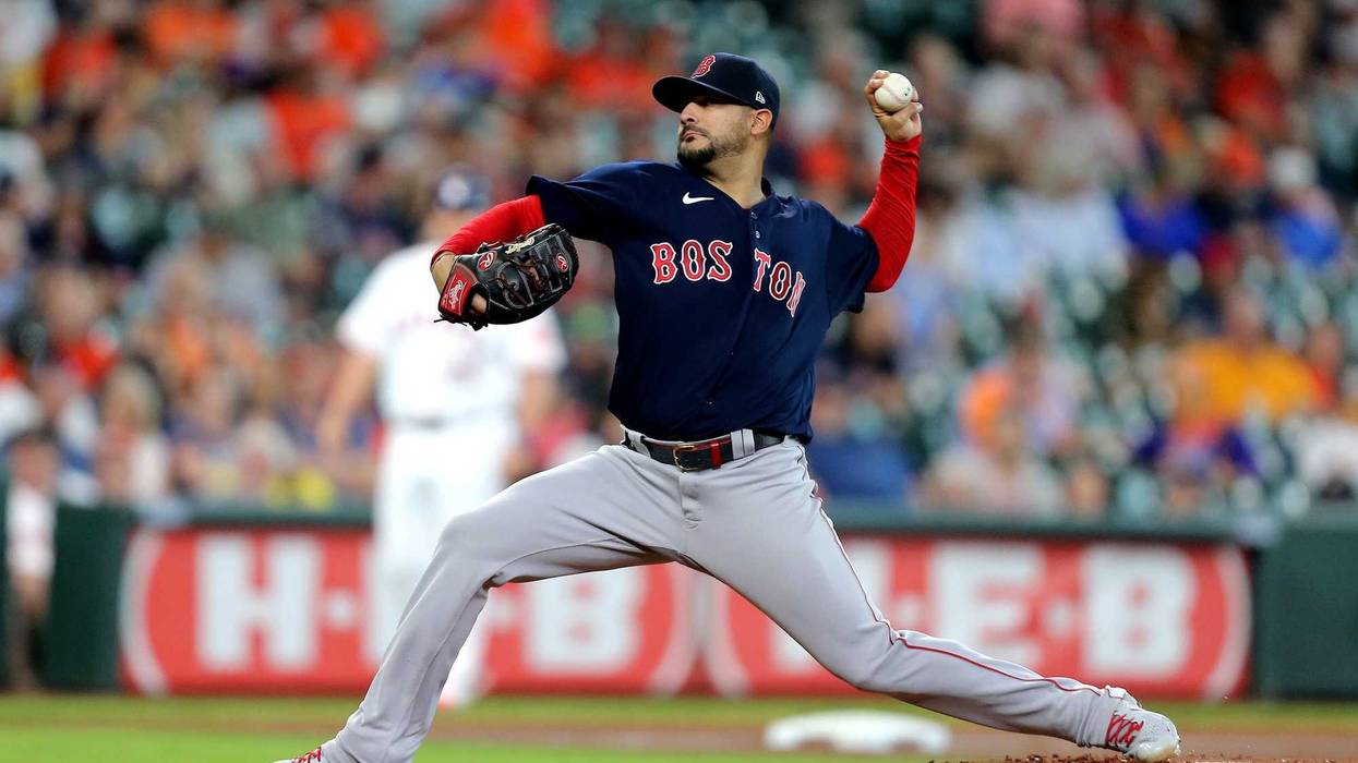 Boston Red Sox starting pitcher Martin Perez (54) delivers a pitch against the Houston Astros during the first inning at Minute Maid Park.