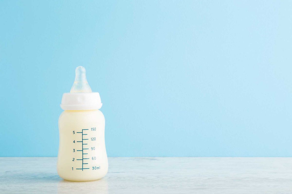 Bottle of a milk for a baby made from formula.