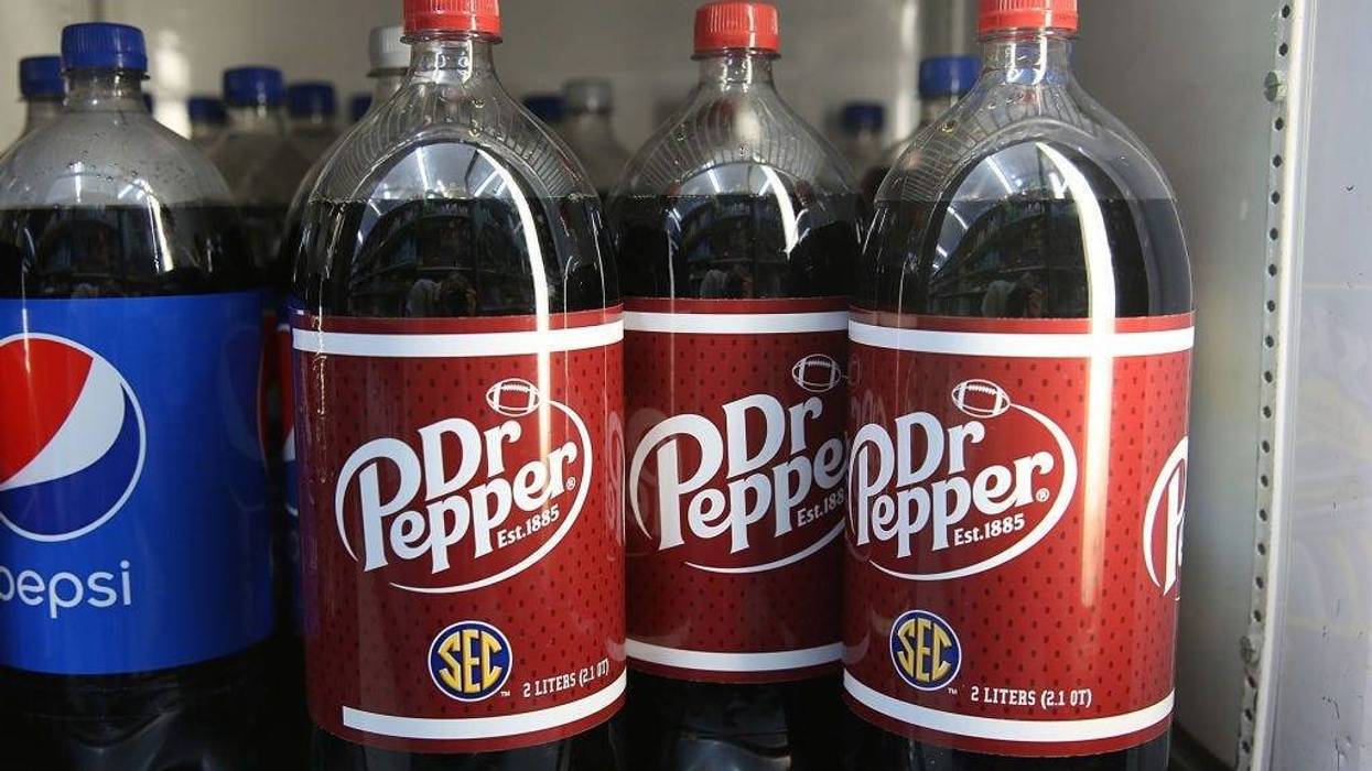 Bottles of Dr Pepper drinks are seen on a store shelf on the day Keurig Green Mountain announced it has struck a deal worth more than $21 billion with Dr Pepper Snapple Group Inc. on January 29, 2018 in Miami, Florida.