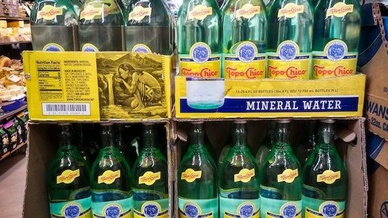 Bottles of Topo Chico in a grocery store