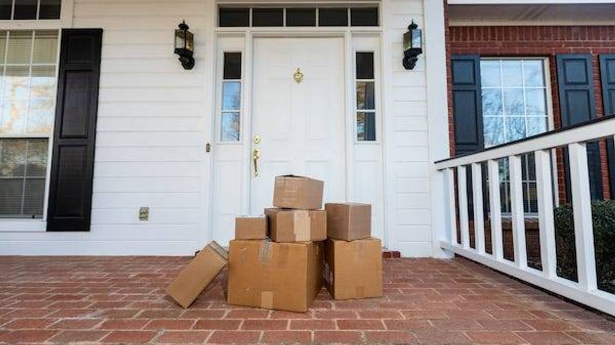 Boxes on porch in front of a home