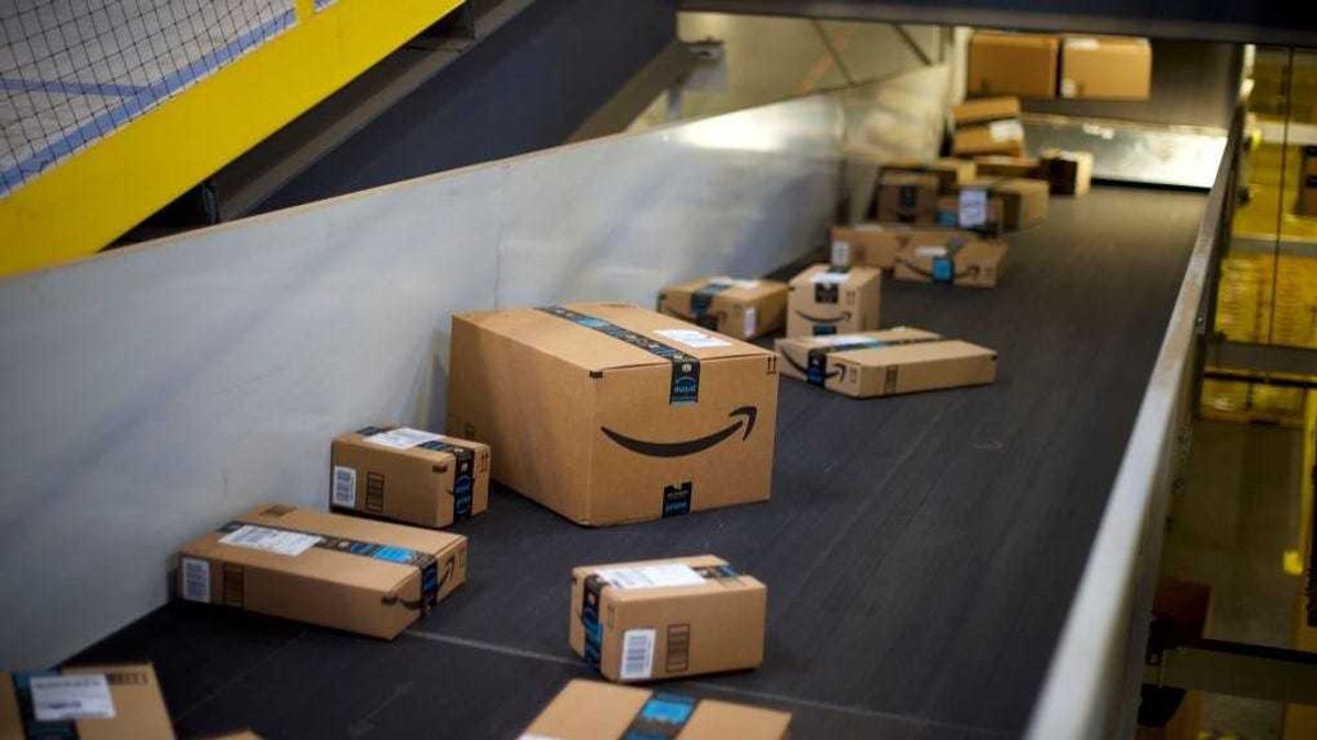 Boxes travel on conveyor belts at the Amazon Fulfillment Center on August 1, 2017 in Robbinsville, New Jersey.