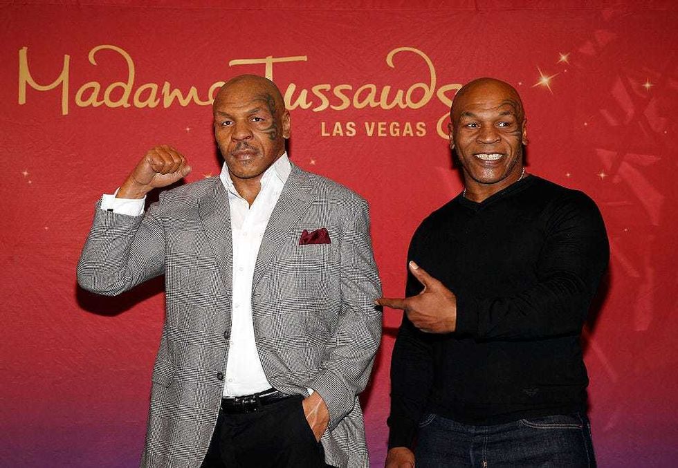 Boxing legend and entertainer Mike Tyson unveils his first Madame Tussauds wax figure at Venetian Las Vegas in 2015.