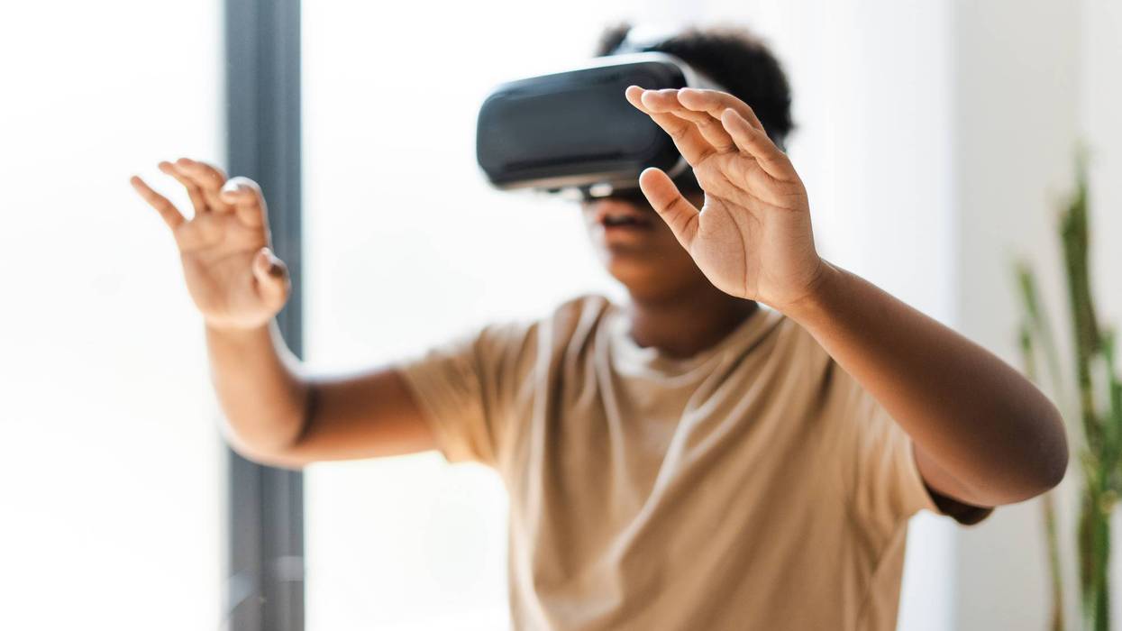boy using VR headset