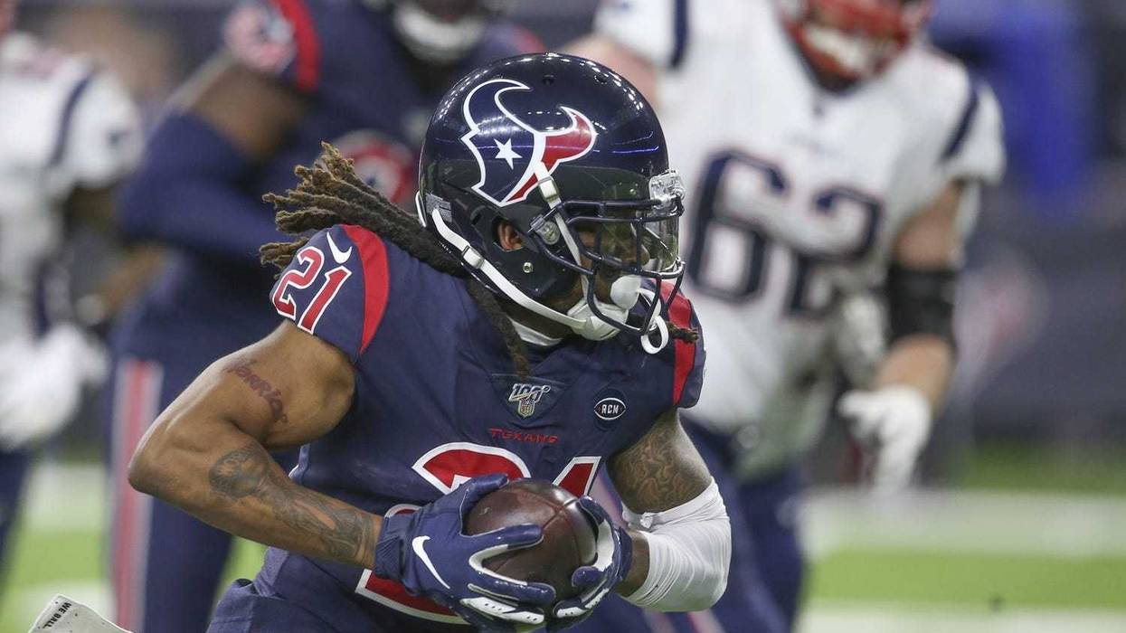 Bradley Roby returns an interception in the first quarter against the Patriots