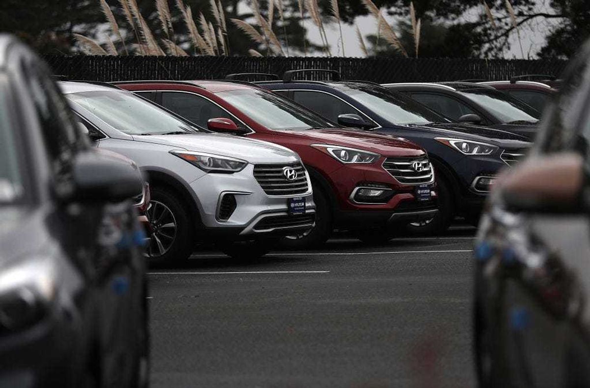 Brand new Hyundai Santa Fe SUVs are displayed at a Hyundai dealership on April 7, 2017 in Colma, California.