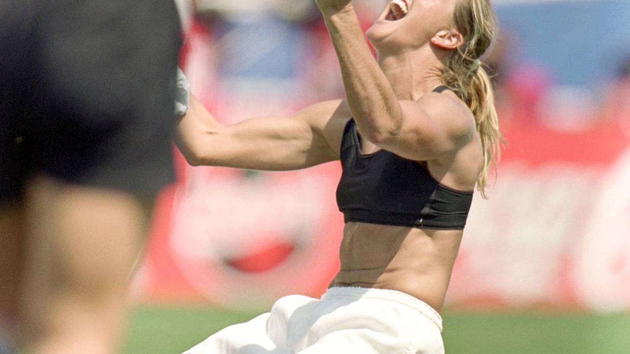 Brandi Chastain of Team USA celebrates during the Women's World Cup against Team China at The Rose Bowl on July 10, 1999 in Pasadena, California.