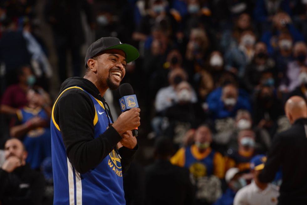 Brandon Leak performing at a Warriors game.