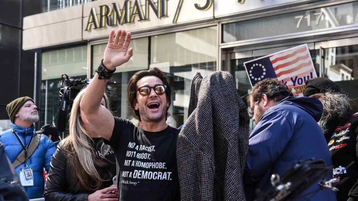 Brandon Straka, founder of the 'WalkAway' movement, (C) attends a rally in support of U.S. President Donald Trump near Trump Tower on March 23, 2019 in New York City.