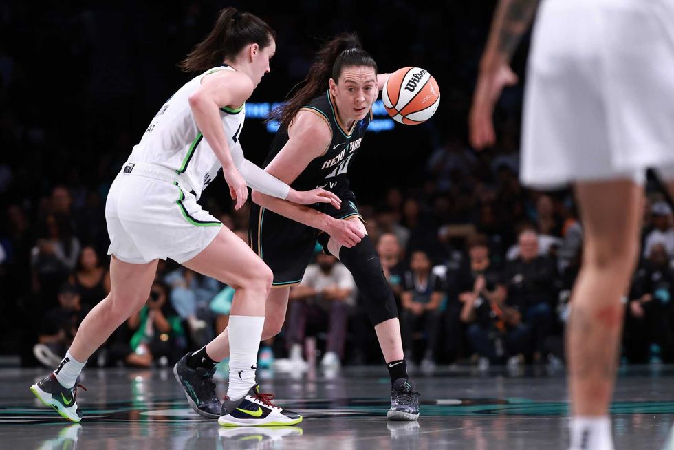 Breanna Stewart #30 of the New York Liberty drives past Bridget Carleton #6 of the Minnesota Lynx during the third quarter of Game Two of the WNBA Finals at Barclays Center on October 13, 2024 in New York City.