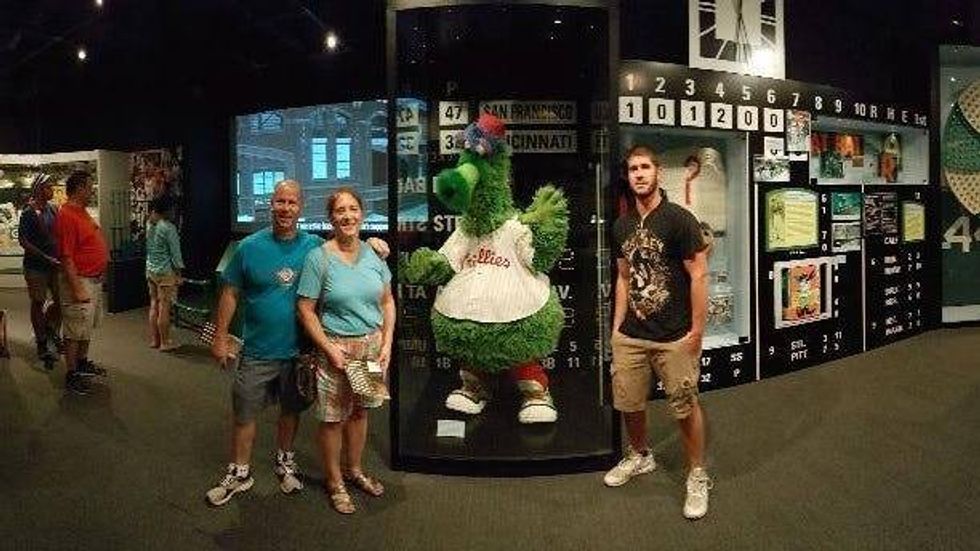 Brendan Hirsh (right) with his parents, Steve and Merri, at the Baseball Hall of Fame in Cooperstown, New York.
