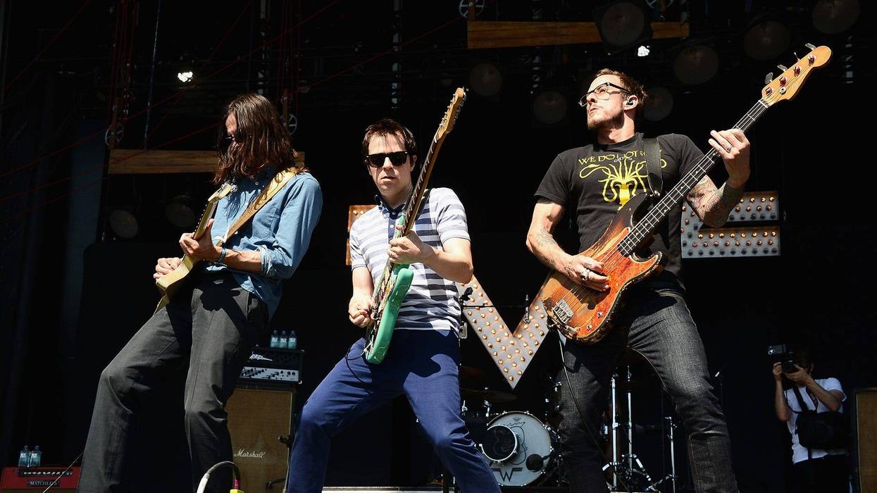Brian Bell, Rivers Cuomo and Scott Shriner of Weezer