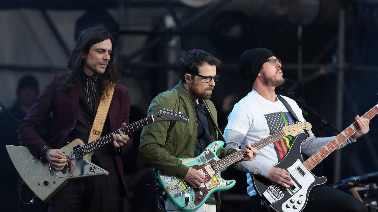 Brian Bell, Rivers Cuomo, and Scott Shriner of Weezer