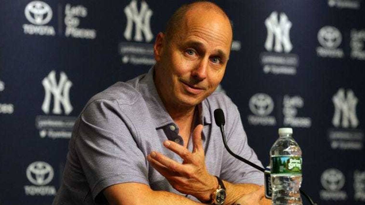Brian Cashman speaks with the media before a game against the Detroit Tigers at Yankee Stadium. The Yankees today traded for Oakland Athletics pitcher Sonny Gray at the MLB trade deadline.