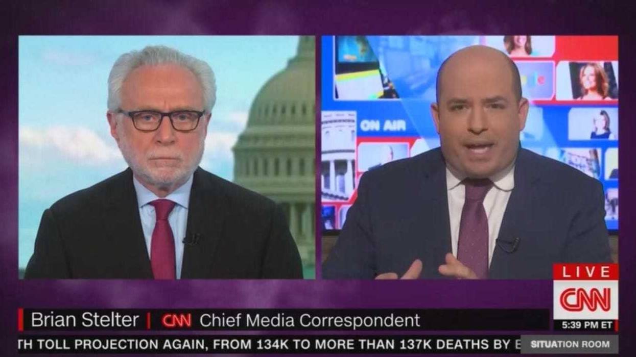 Brian Stelter and Wolf Blitzer