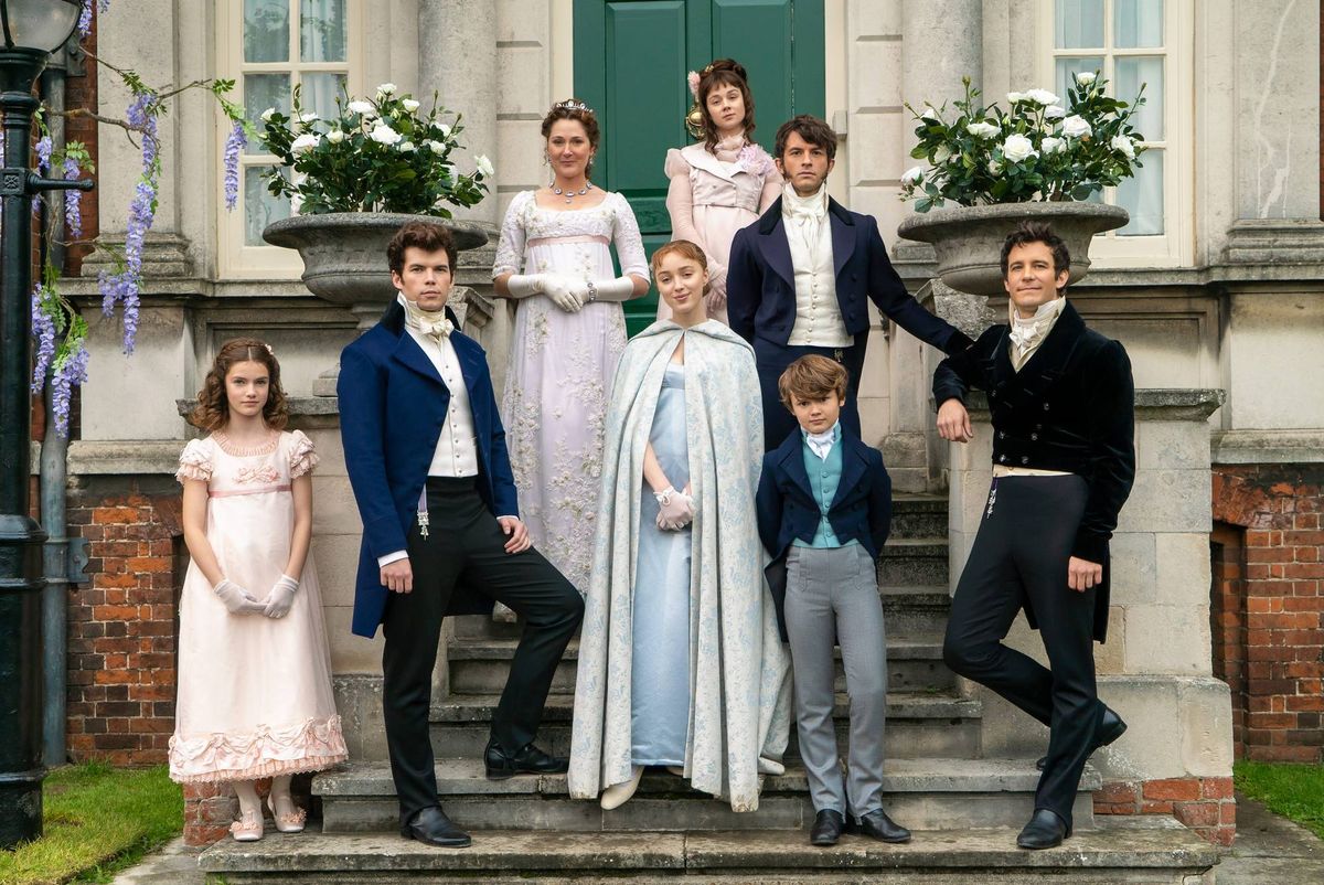 BRIDGERTON (L to R) FLORENCE HUNT as HYACINTH BRIDGERTON, LUKE NEWTON as COLIN BRIDGERTON, RUTH GEMMELL as LADY VIOLET BRIDGERTON, PHOEBE DYNEVOR as DAPHNE BRIDGERTON, CLAUDIA JESSIE as ELOISE BRIDGERTON, JONATHAN BAILEY as ANTHONY BRIDGERTON, WILL TILSTON as GREGORY BRIDGERTON and LUKE THOMPSON as BENEDICT BRIDGERTON in episode 105 of BRIDGERTON