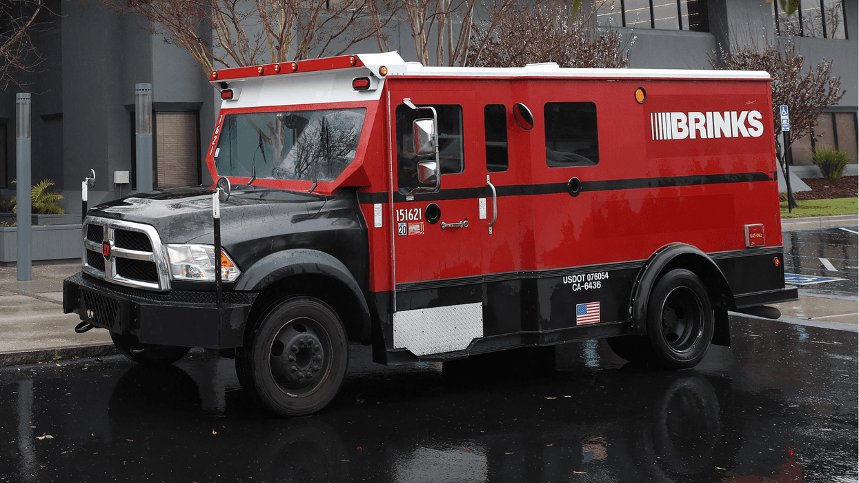 Brink's armored truck guard robbed at gunpoint in Reseda; unknown amount of money stolen