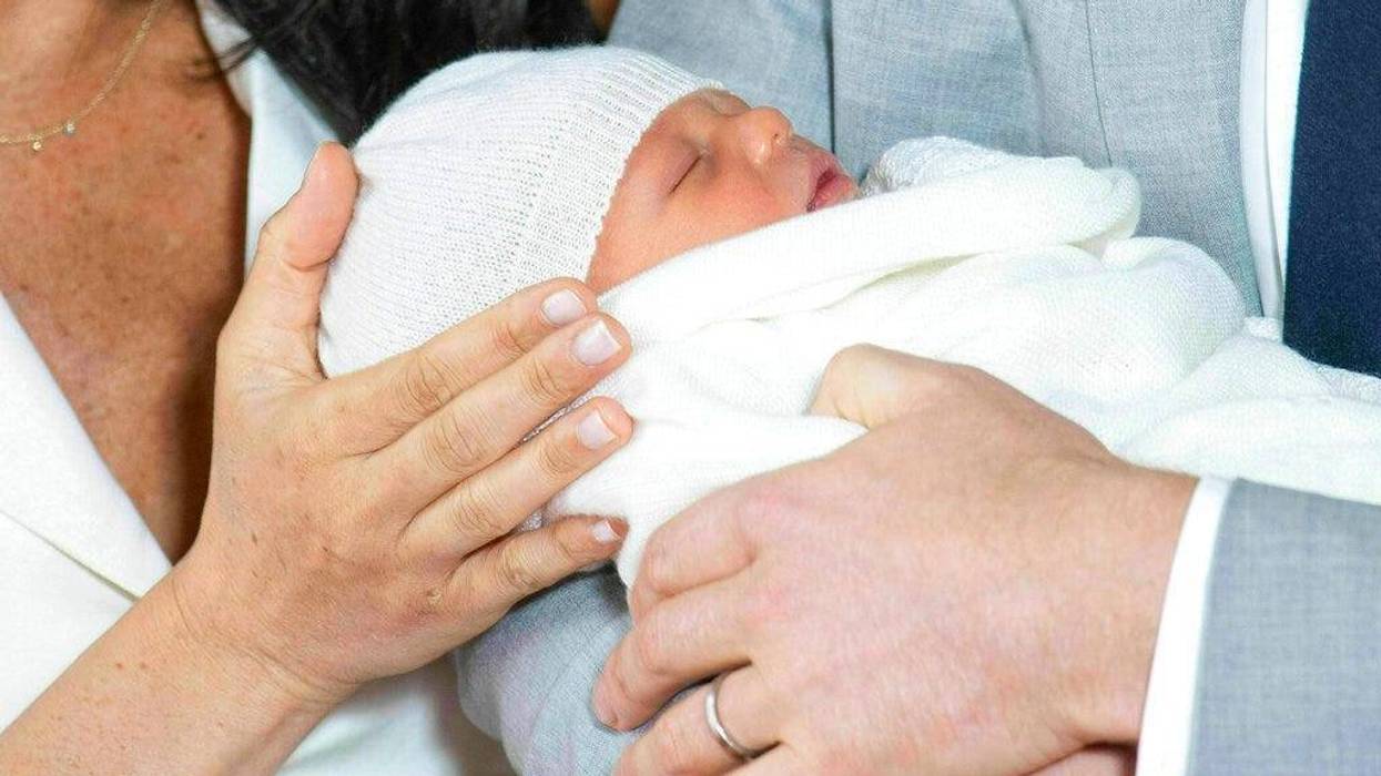 Britain's Prince Harry and Meghan, Duchess of Sussex, during a photocall with their newborn son