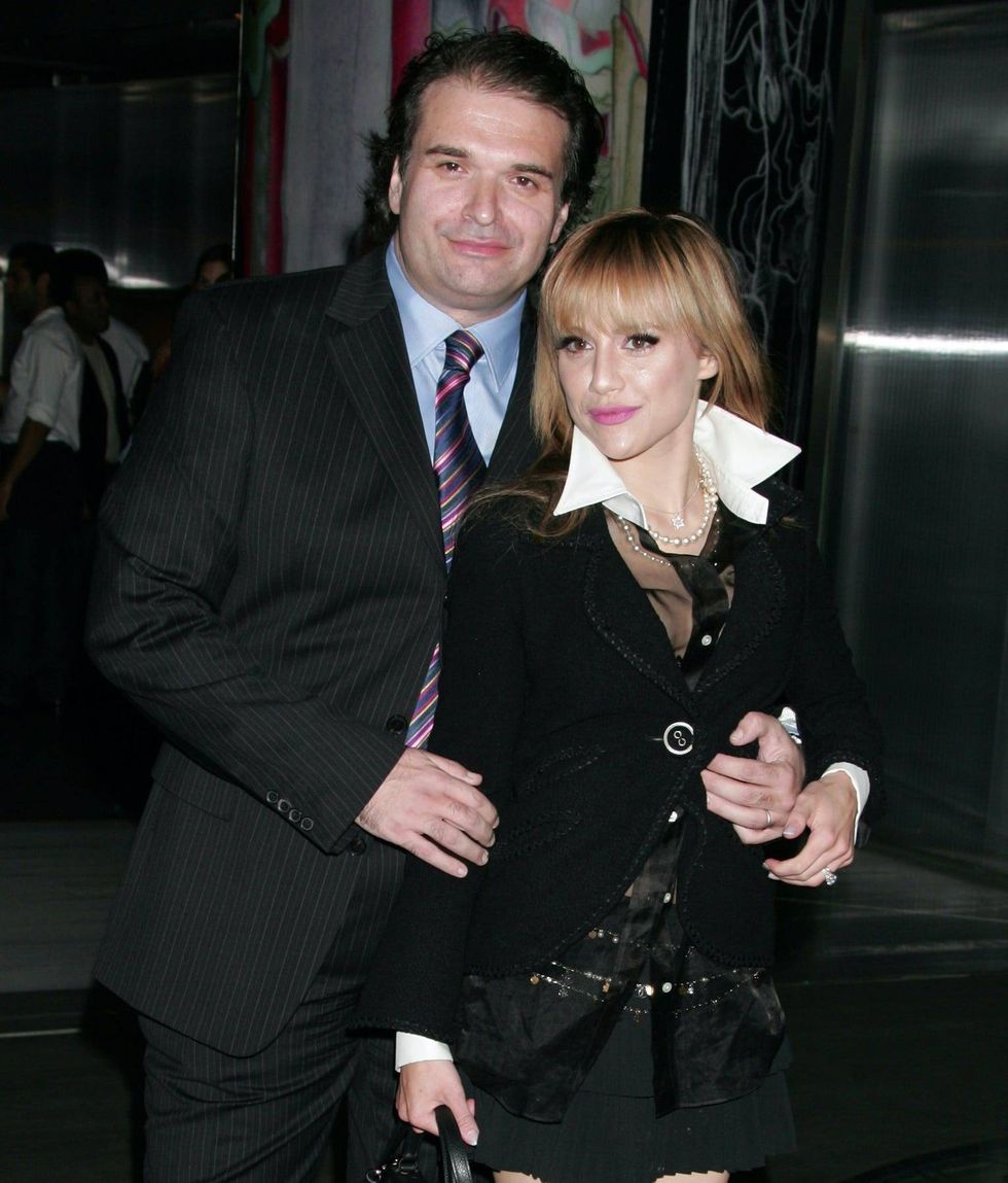 Brittany Murphy (R) and husband writer/producer/director Simon Monjack attend the Prada Los Angeles screening of