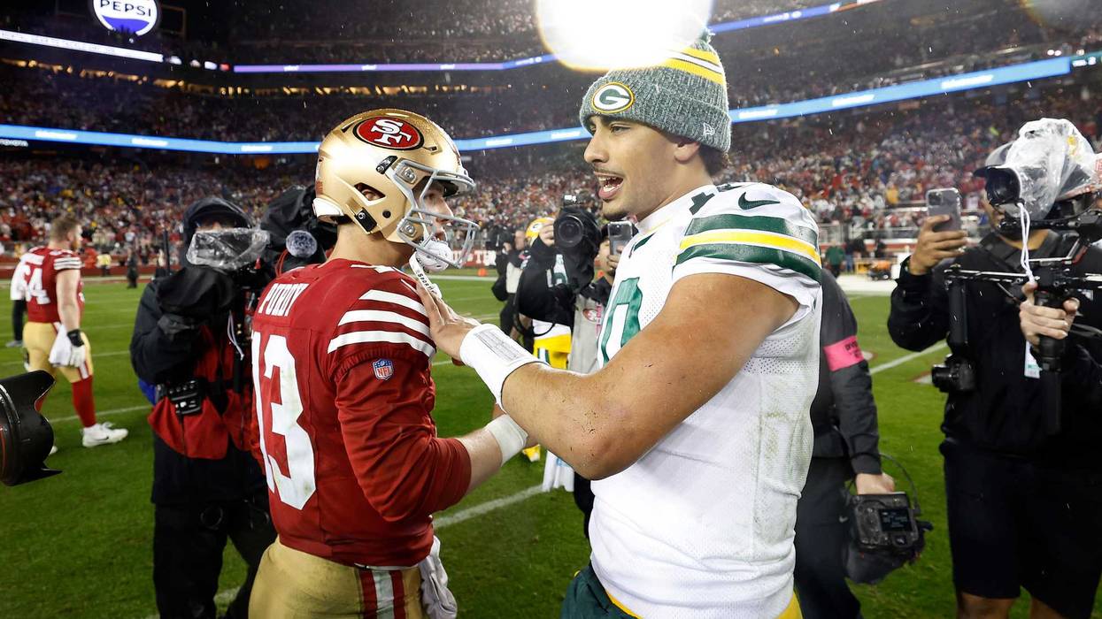 Brock Purdy, of the San Francisco 49ers, greets Jordan Love, of the Green Bay Packers, after the 49ers defeated the Packers 24-21 in the NFC Divisional Playoffs at Levi's Stadium on January 20, 2024.