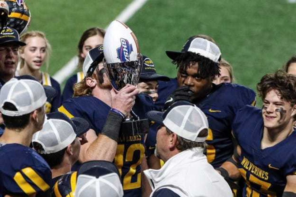 Brock Vandagriff had a big kiss for that GHSA state championship trophy on Monday night.