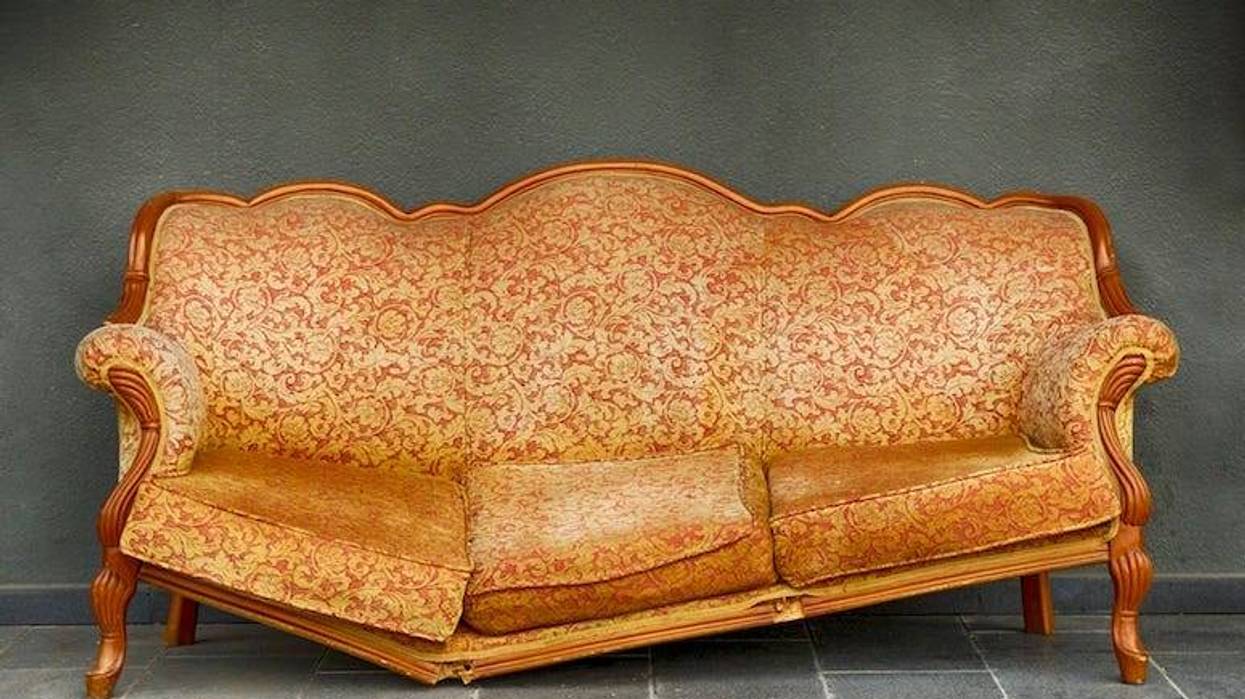 Broken Armchair, Orange, Wall