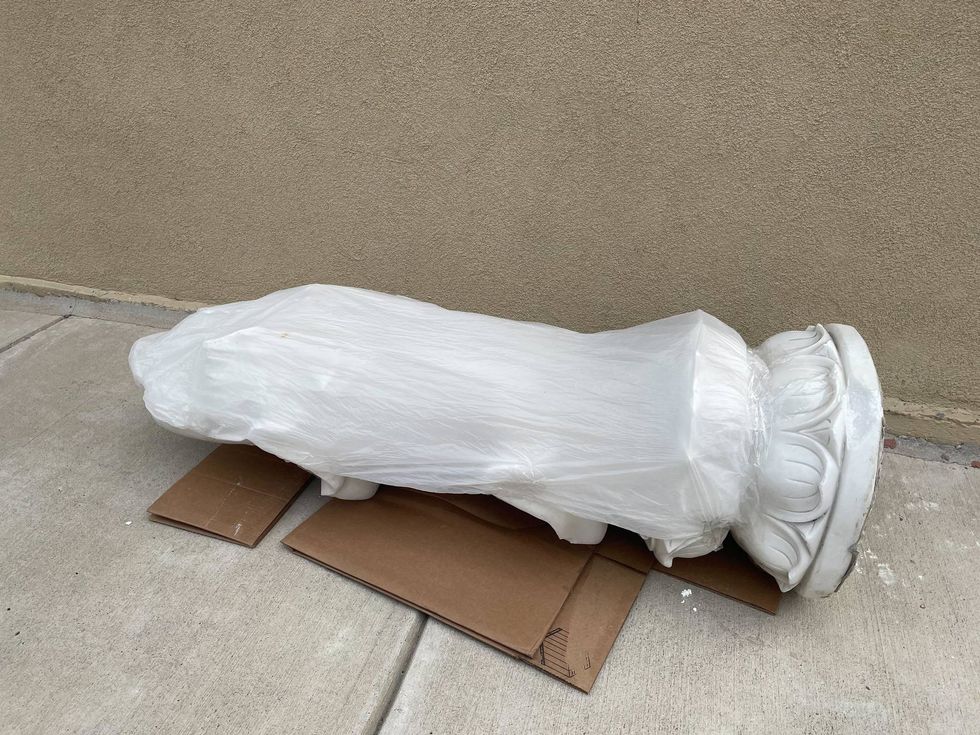 Broken Kuan Yin statue