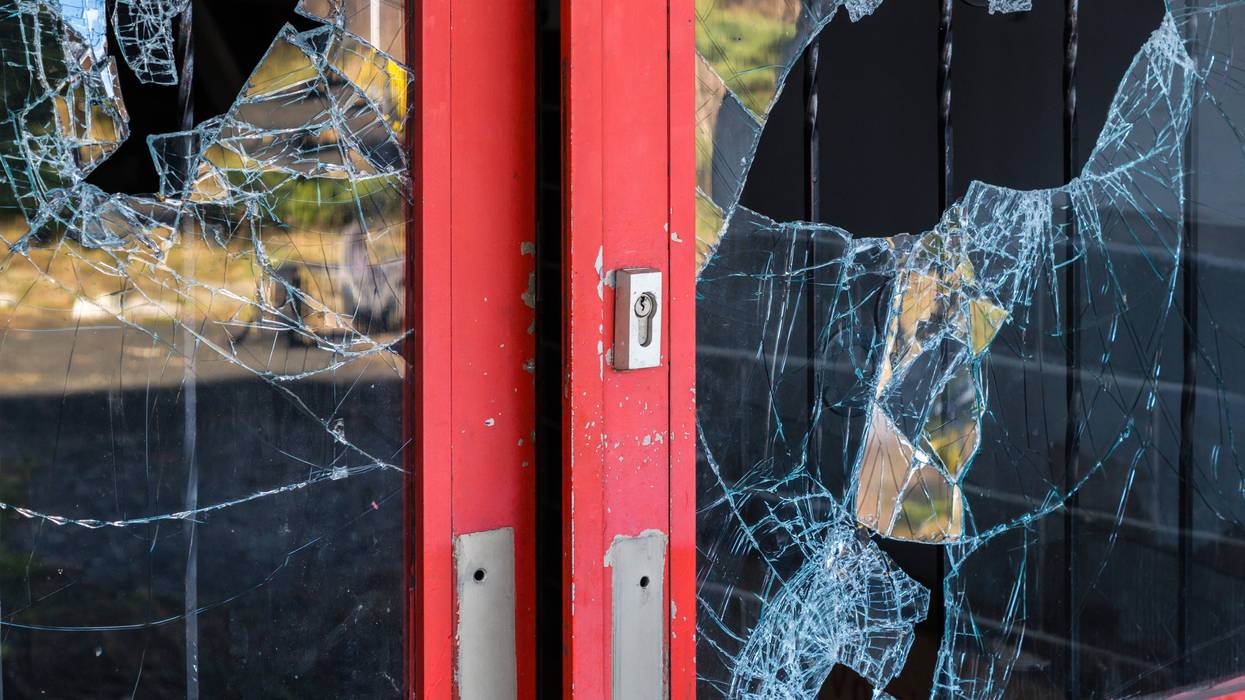broken storefront window pane