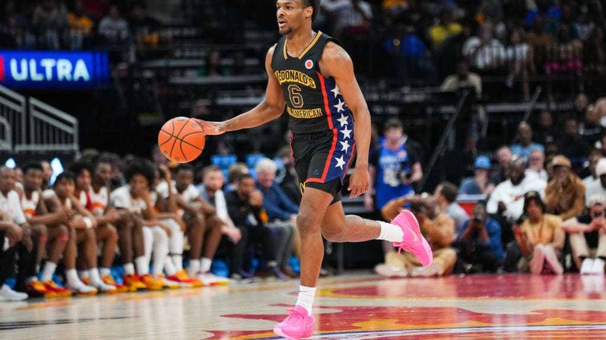 Bronny James #6 of the West team dribbles the ball during the 2023 McDonald's High School Boys All-American Game at Toyota Center on March 28, 2023 in Houston, Texas.