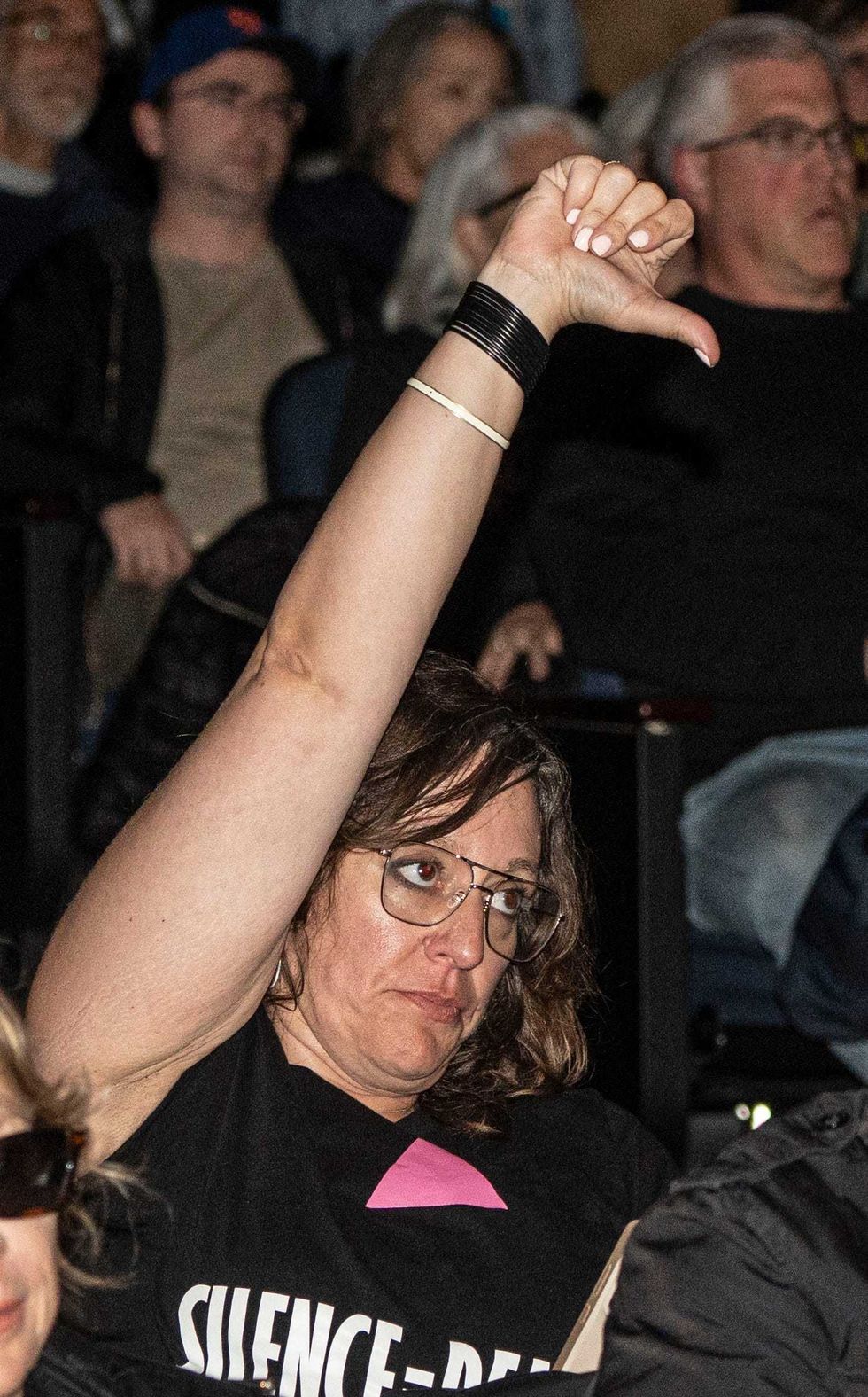 Brooke Malloy, Executive Director of the Phyllis B. Frank Rockland County Pride Center, reacts to a comment by U.S. Rep. Mike Lawler during a town hall event at Clarkstown South High School in West Nyack April 27, 2025