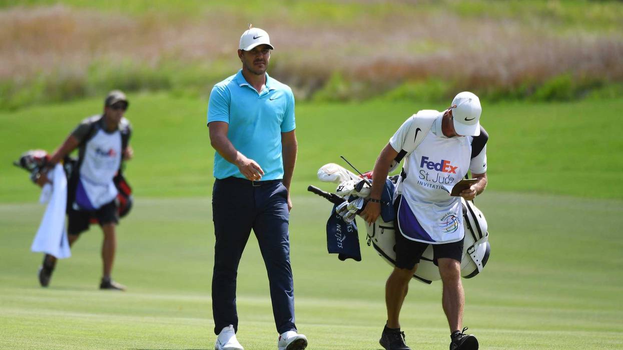 Brooks Koepka walks up the ninth fairway during the first round of the WGC - FedEx St. Jude Invitational golf tournament at TPC Southwind