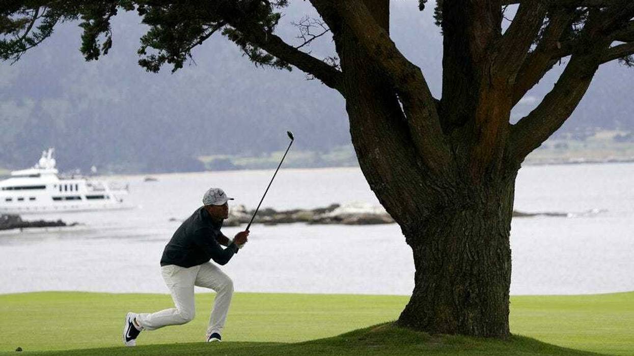Brooks Koepka watches his shot from 18th fairway during the third round of the U.S. Open golf tournament Saturday, June 15, 2019, in Pebble Beach, Calif. (
