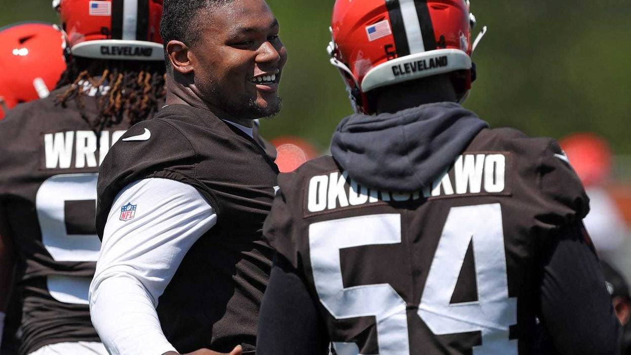 Browns defensive tackle Mike Hall Jr. (51) chats with defensive end Ogbo Okoronkwo during minicamp, Wednesday, June 12, 2024, in Berea.