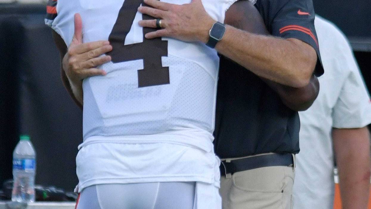 Browns owner Jimmy Haslam hugs quarterback Deshaun Watson before the team's preseason game