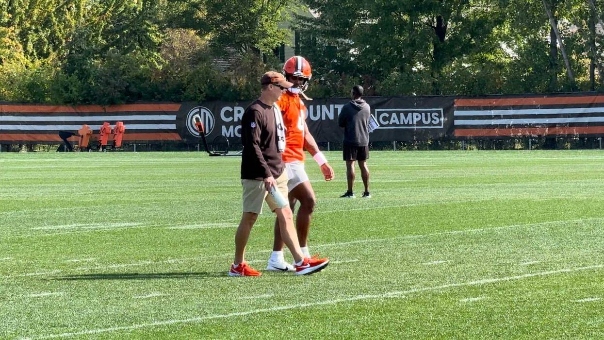 Browns quarterback Deshaun Watson talks with head athletic trainer Joe Sheehan during practice on September 29, 2023.