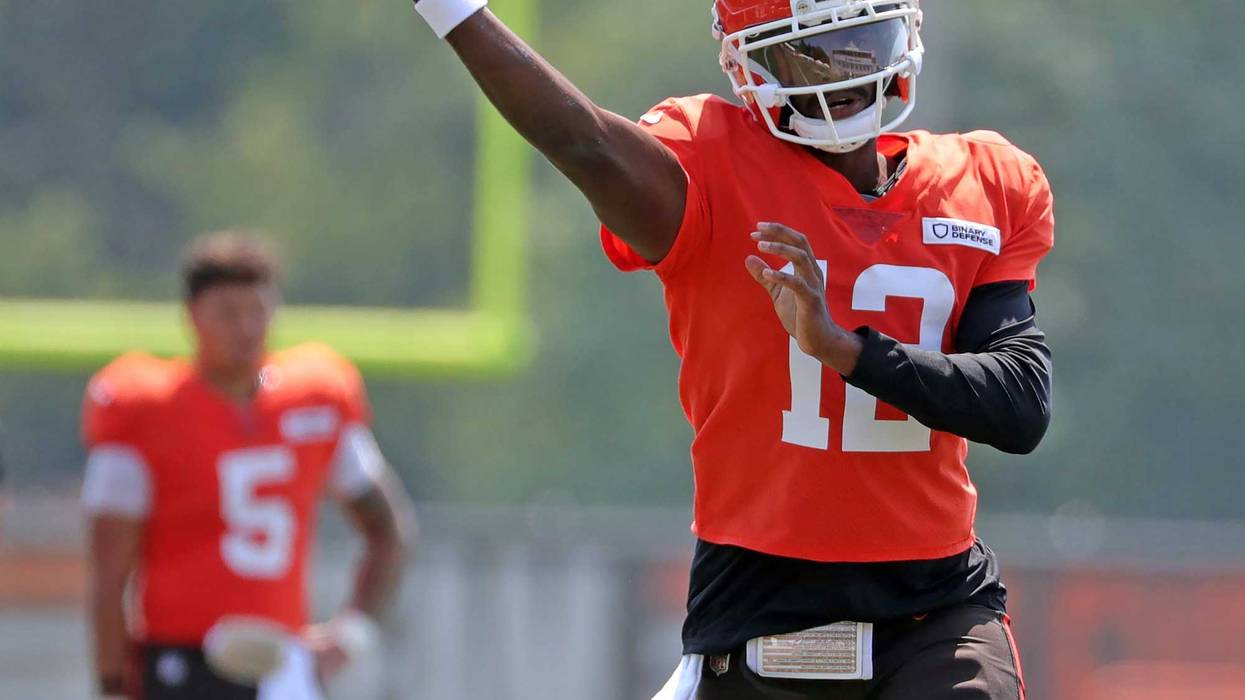 Browns quarterback Shedeur Sanders throws as Dillon Gabriel looks on during training camp, Friday, Aug. 1, 2025, in Berea. © Jeff Lange / USA TODAY NETWORK via Imagn Images