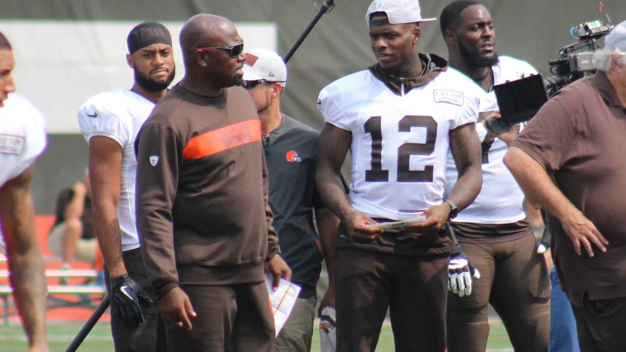 Browns receiver Josh Gordon chats with receivers coach Adam Henry during a practice on Aug. 19, 2018