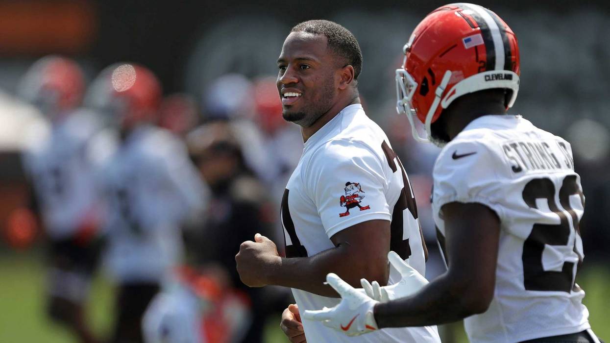 Browns running backs Nick Chubb (left) and Pierre Strong Jr. jog the field during minicamp in Berea.