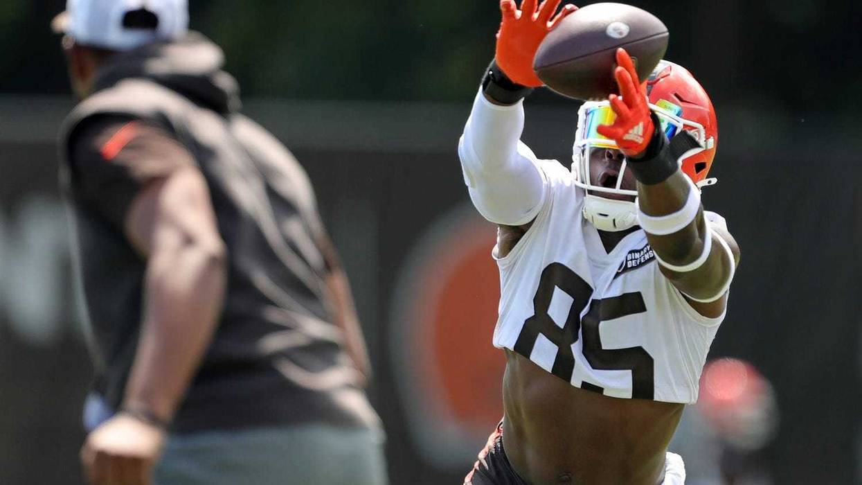 Browns tight end David Njoku reaches for a pass during minicamp, Thursday, June 13, 2024, in Berea.