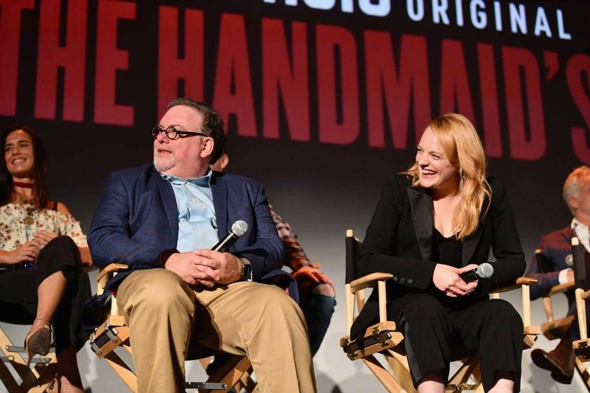 Bruce Miller and Elisabeth Moss speak onstage during "The Handmaid's Tale" Hulu finale at The Wilshire Ebell Theatre on July 9, 2018 in Los Angeles, California