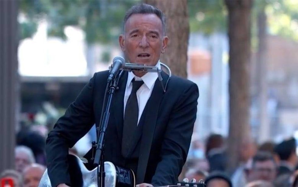 Bruce Springsteen performs at the 9/11 Memorial commemoration ceremony. Photo credit National September 11 Memorial & Museum