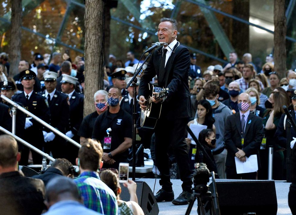 Bruce Springsteen performs at the National 9/11 Memorial and Museum ceremony commemorating the 20th anniversary of the 9/11 attacks on the World Trade Center on September 11, 2021 in New York City