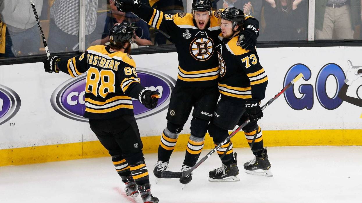 Bruins David Pastrnak, Charlie Coyle and Charlie McAvoy