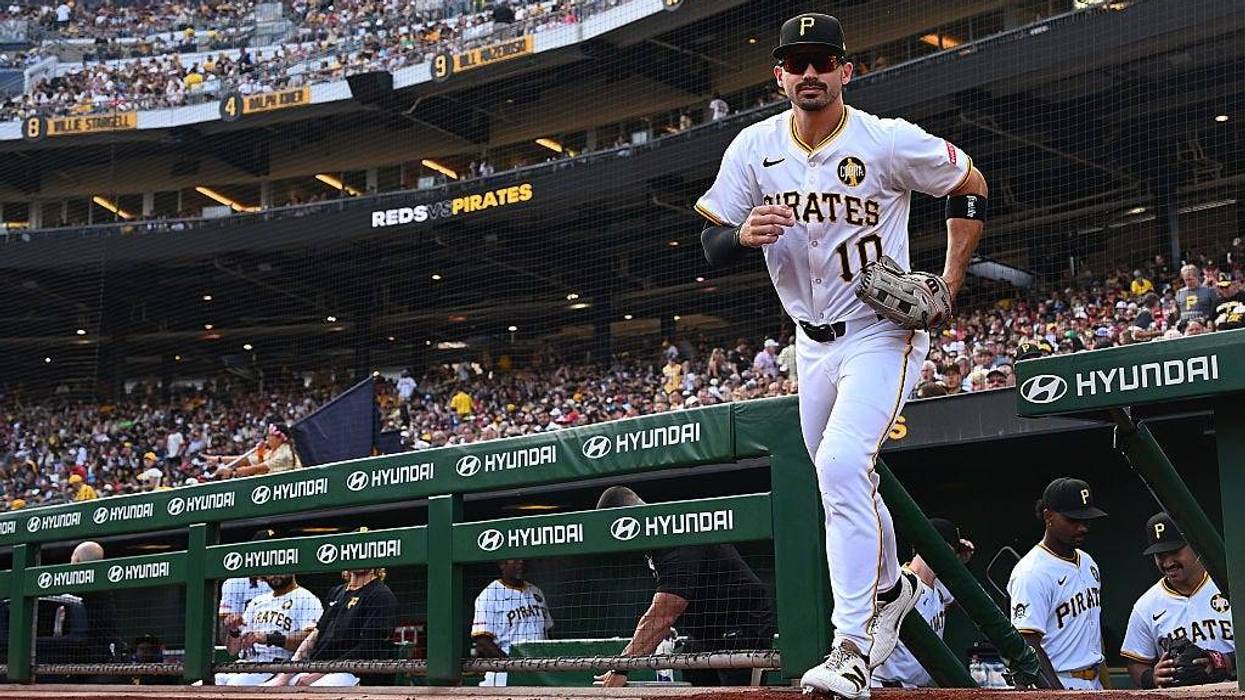 Bryan Reynolds running onto the field