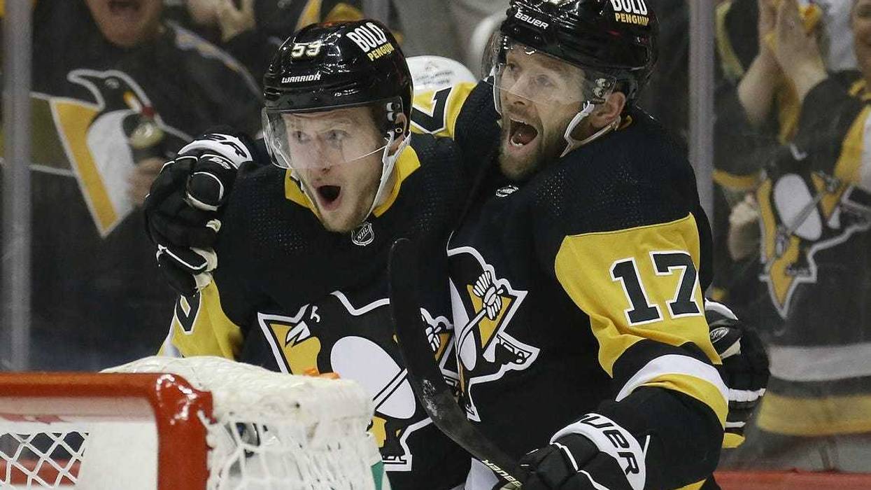 Bryan Rust and Jake Guentzel excited after scoring