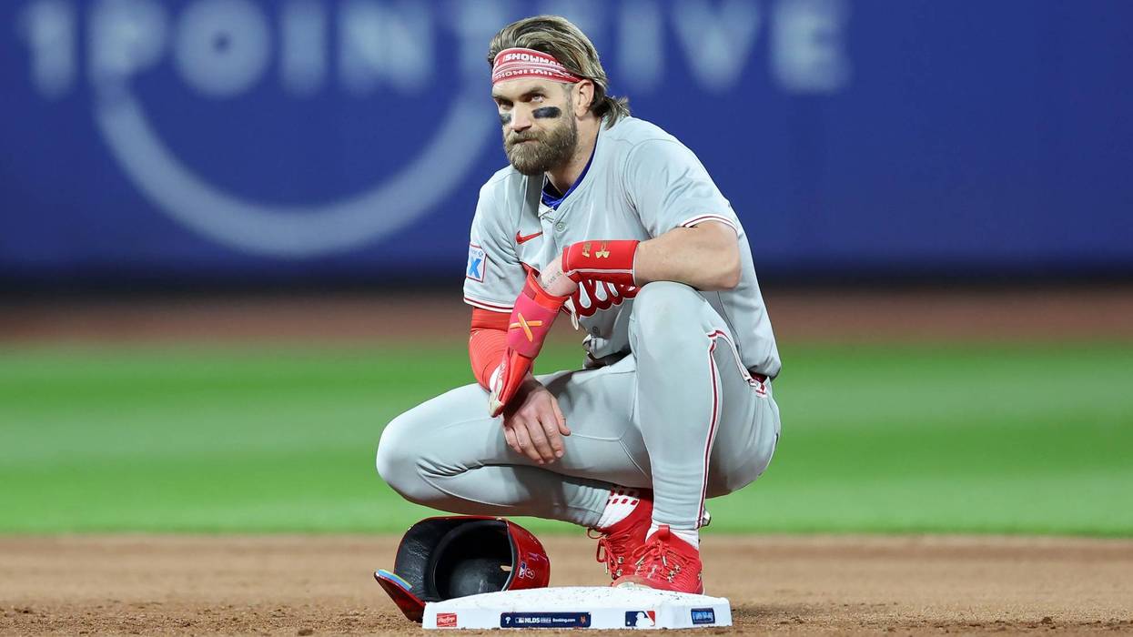 Bryce Harper looks on from second base in the sixth inning against the New York Mets during Game Four of the Division Series.