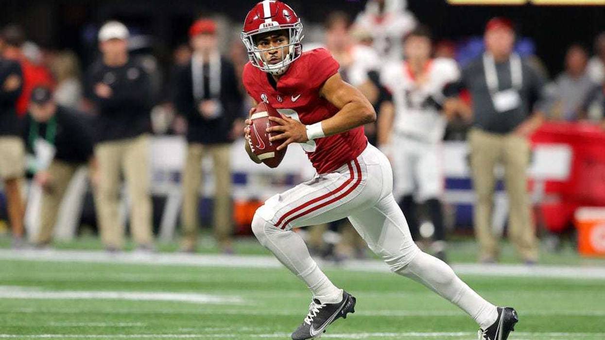Bryce Young #9 of the Alabama Crimson Tide looks to pass in the second quarter of the SEC Championship game against the Georgia Bulldogs at Mercedes-Benz Stadium on December 04, 2021 in Atlanta, Georgia.