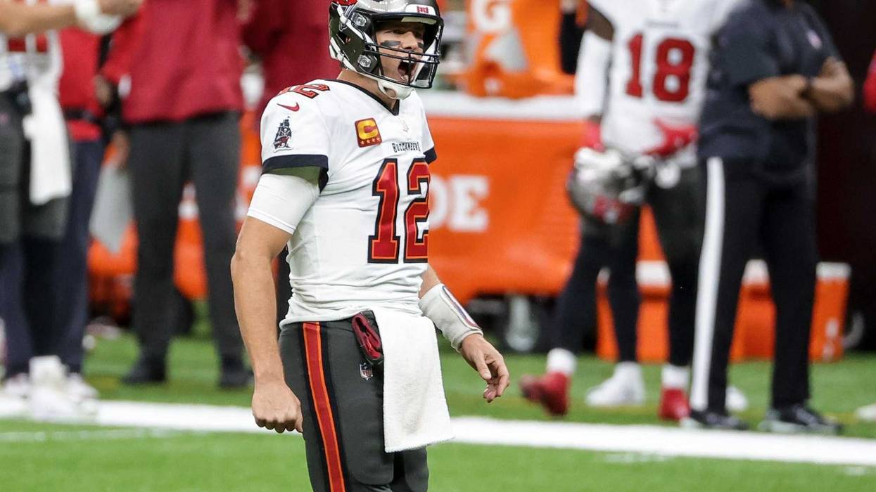 Bucs QB Tom Brady celebrates after a TD pass during Tampa's 30-20 victory of New Orleans.