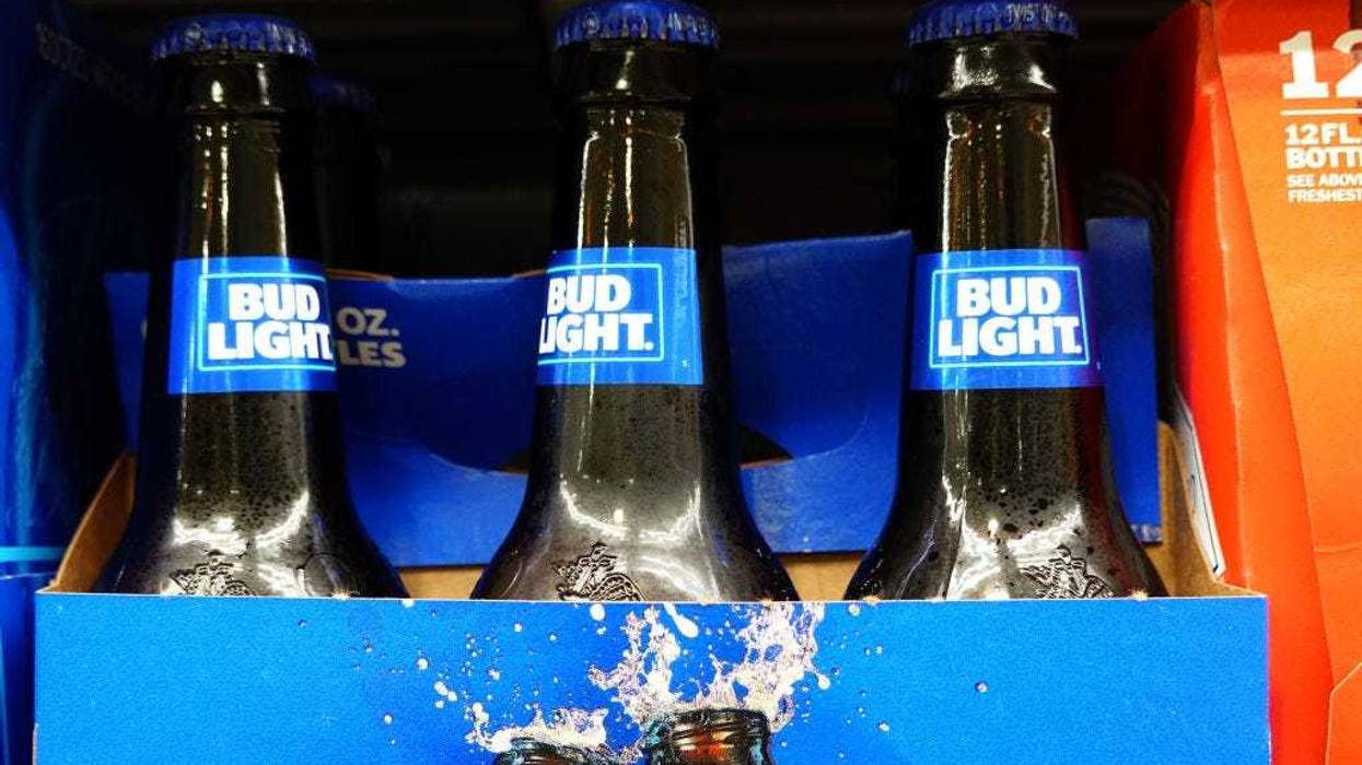 Bud Light, made by Anheuser-Busch, sits on a store shelf on July 27, 2023 in Miami, Florida. Anheuser-Busch InBev announced it will lay off hundreds of corporate employees as its Bud Light beer sales continue to struggle. (Photo by Joe Raedle/Getty Images)