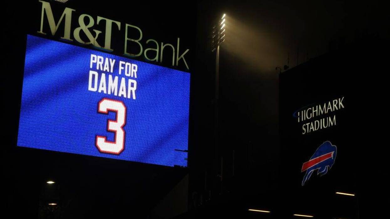 Buffalo Bills fans attend a candlelight prayer vigil for player Damar Hamlin at Highmark Stadium on January 3, 2023 in Orchard Park, New York.